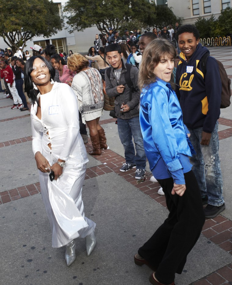 The caption info is: The largest Soul Train dance consisted of 211 participants and was achieved by Berkeley High School students, staff and alumni (all USA), in Berkeley, California, USA, in celebration of Guinness World Records Day 2011.
Photographer: RC Rivera/Guinness World Records